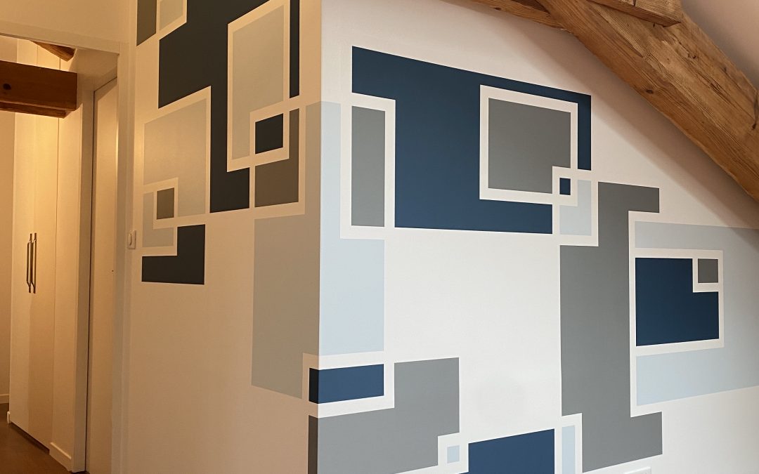 Chantier Lyon 6 Brottaux, rénovation d’une grande pièce de vie et d’une chambre avec une peinture décorative.