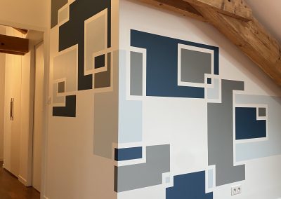 Chantier Lyon 6 Brottaux, rénovation d’une grande pièce de vie et d’une chambre avec une peinture décorative.